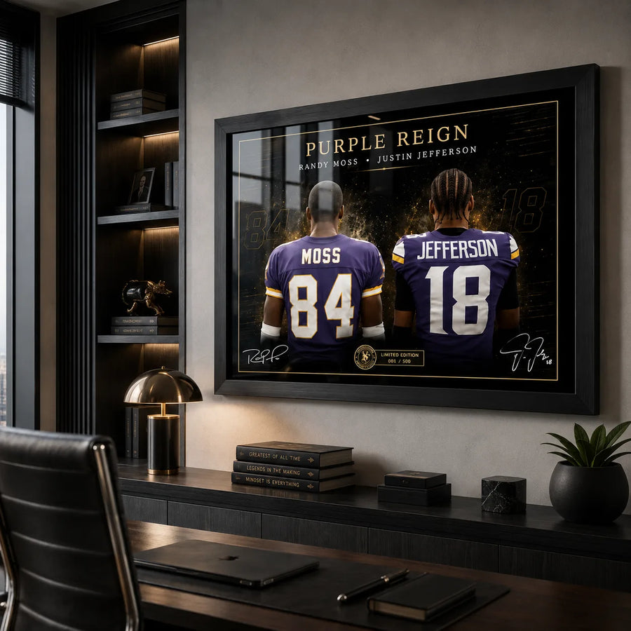 Black framed Purple Reign Randy Moss and Justin Jefferson wall art displayed above a desk in a modern office.
