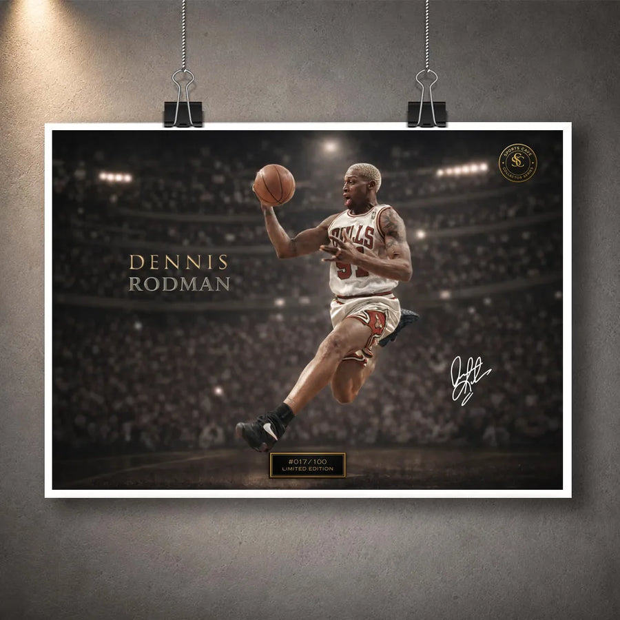 Dennis Rodman basketball wall art displayed unframed with a white border and hanging clips on a grey wall.