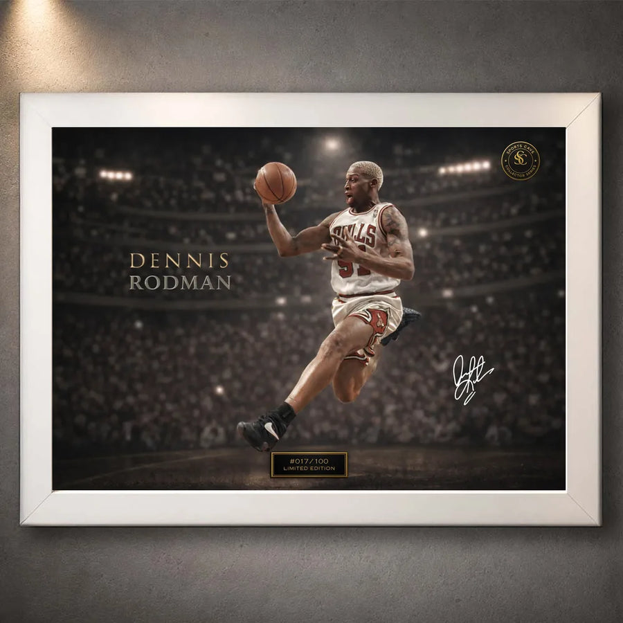 Dennis Rodman basketball wall art shown in a white frame with arena artwork, signature detail and edition plaque.
