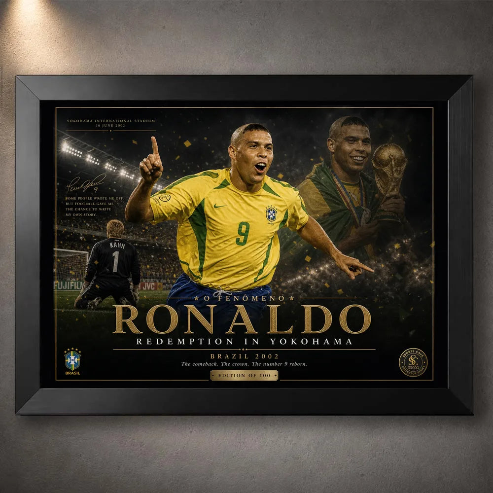 Black framed Ronaldo Nazário Brazil 2002 soccer wall art with Yokohama redemption artwork and gold detail.
