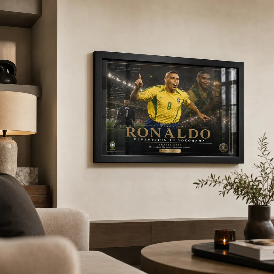 Ronaldo Nazário Brazil 2002 soccer wall art in a black frame displayed in a premium living room.