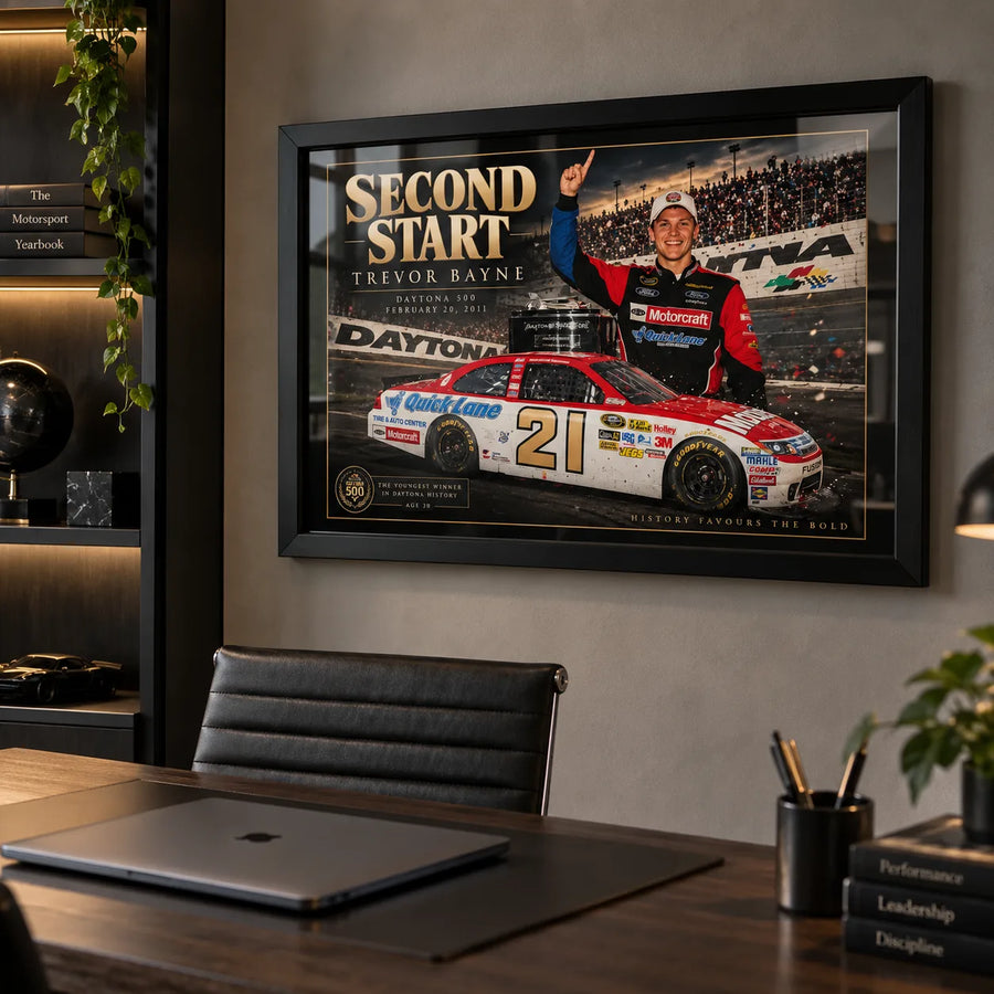 Trevor Bayne NASCAR wall art displayed in a premium office setting with a black frame and dark wood furnishings.