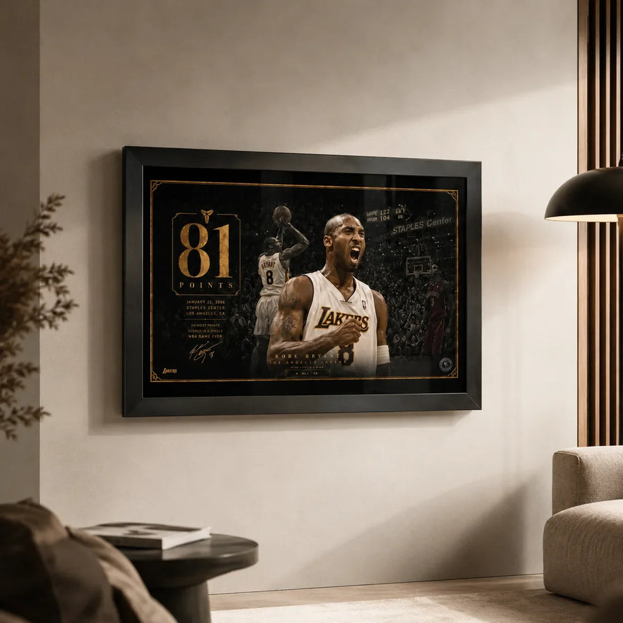 Kobe Bryant 81-point game wall art in a black frame displayed in a warm modern living room