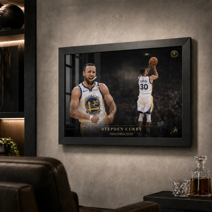 Stephen Curry framed basketball print displayed in a dark collector lounge with shelves and leather seating.