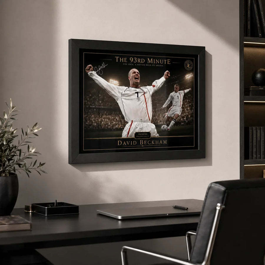 David Beckham framed soccer artwork shown above a clean office desk in a refined black frame.