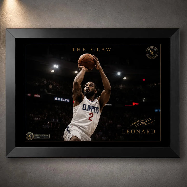 Kawhi Leonard The Claw basketball wall art in a black frame, shown as a close-up product display on a dark grey wall.
