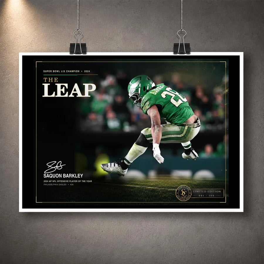 Unframed The Leap Saquon Barkley NFL wall art shown as a print with a white border and hanging clips.