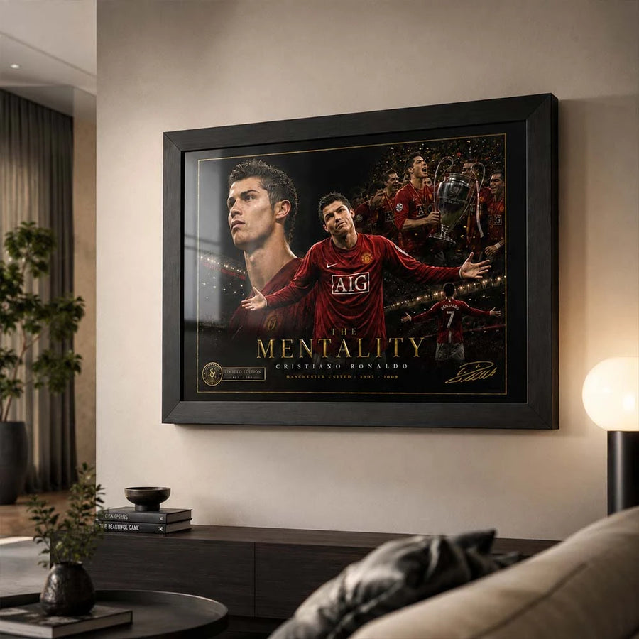 Living room mockup of The Mentality Cristiano Ronaldo framed sports art with red and gold collector detail for fans.