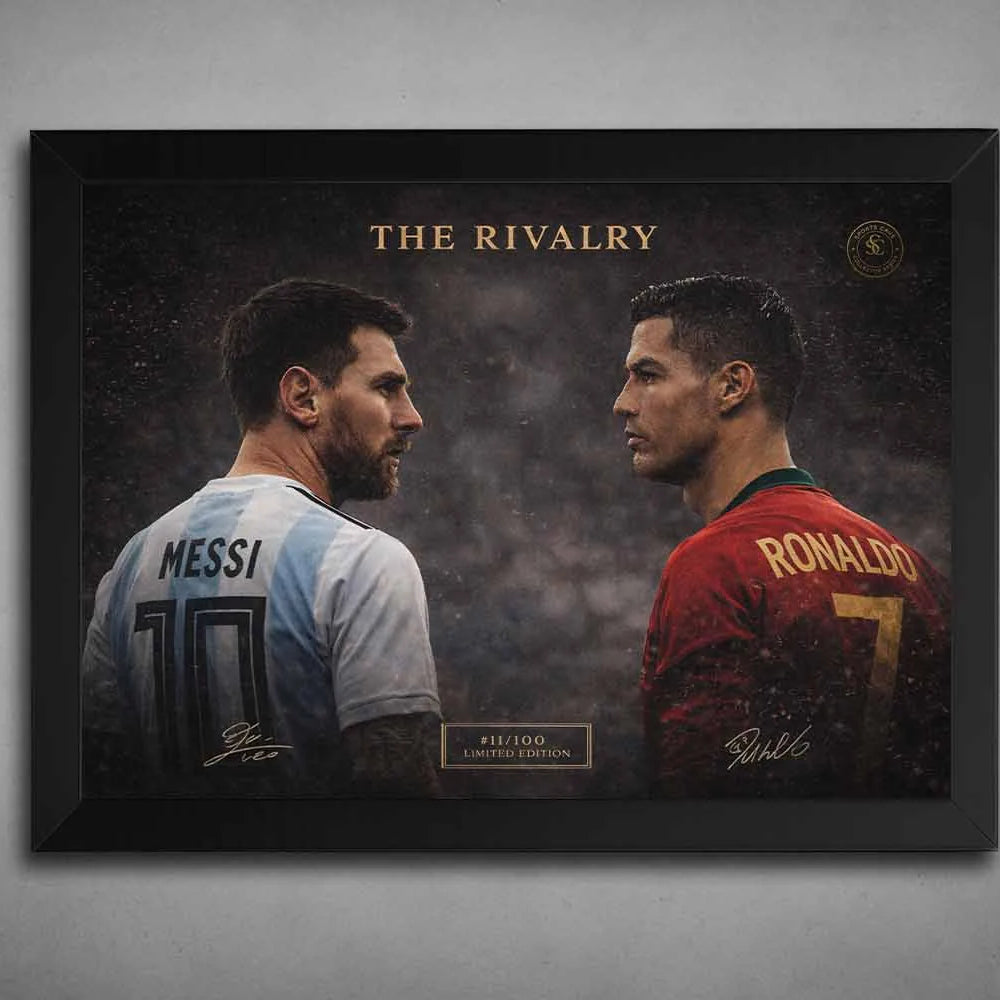 Black framed wall art showing Lionel Messi and Cristiano Ronaldo facing off, a dramatic soccer rivalry piece for framed sports art collectors.
