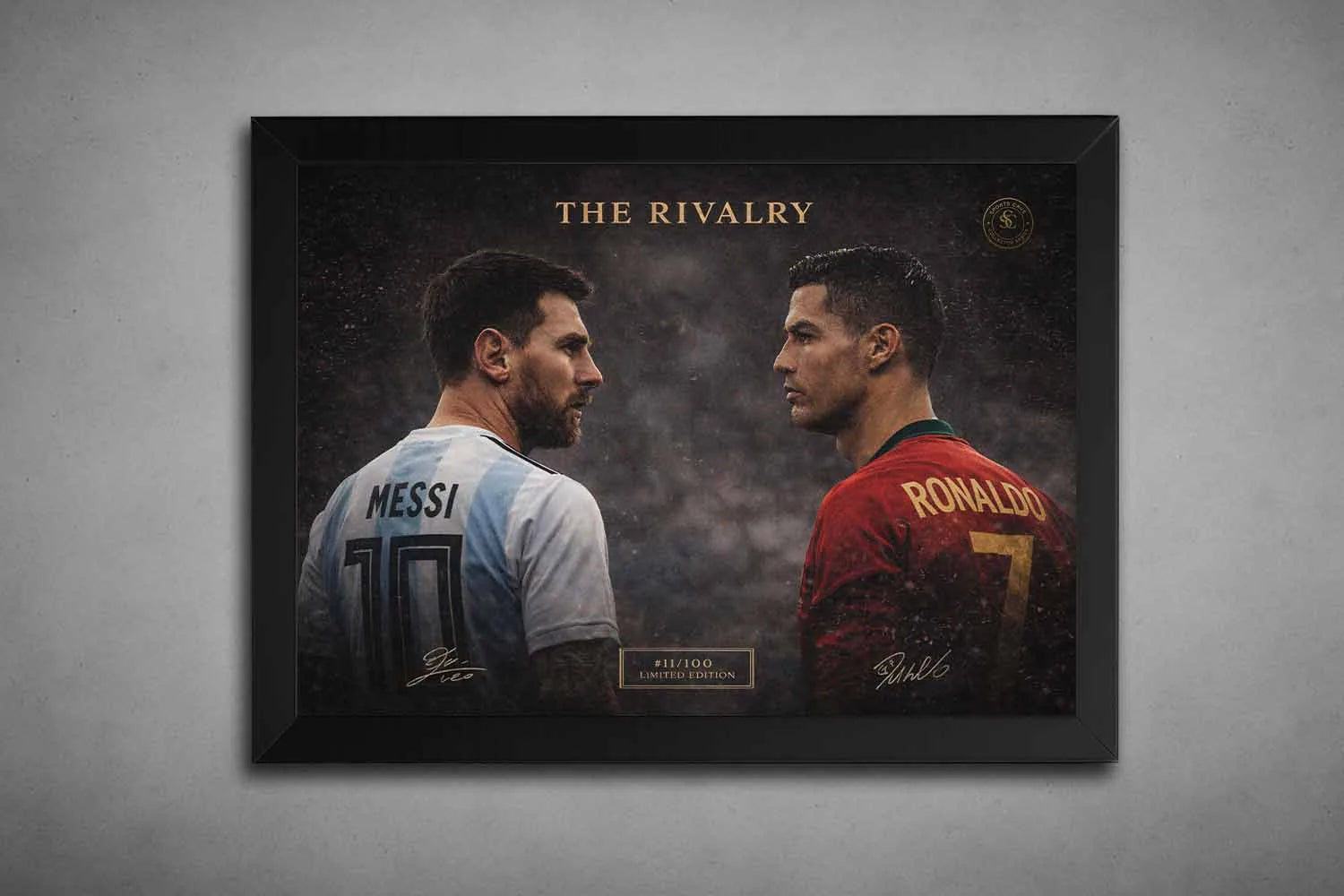 Black framed wall art showing Lionel Messi and Cristiano Ronaldo facing off, a dramatic soccer rivalry piece for framed sports art collectors.