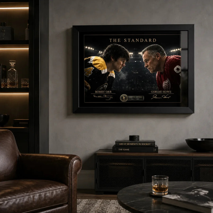 The Standard Bobby Orr vs Gordie Howe artwork displayed in a dark hockey-themed man cave with leather seating.