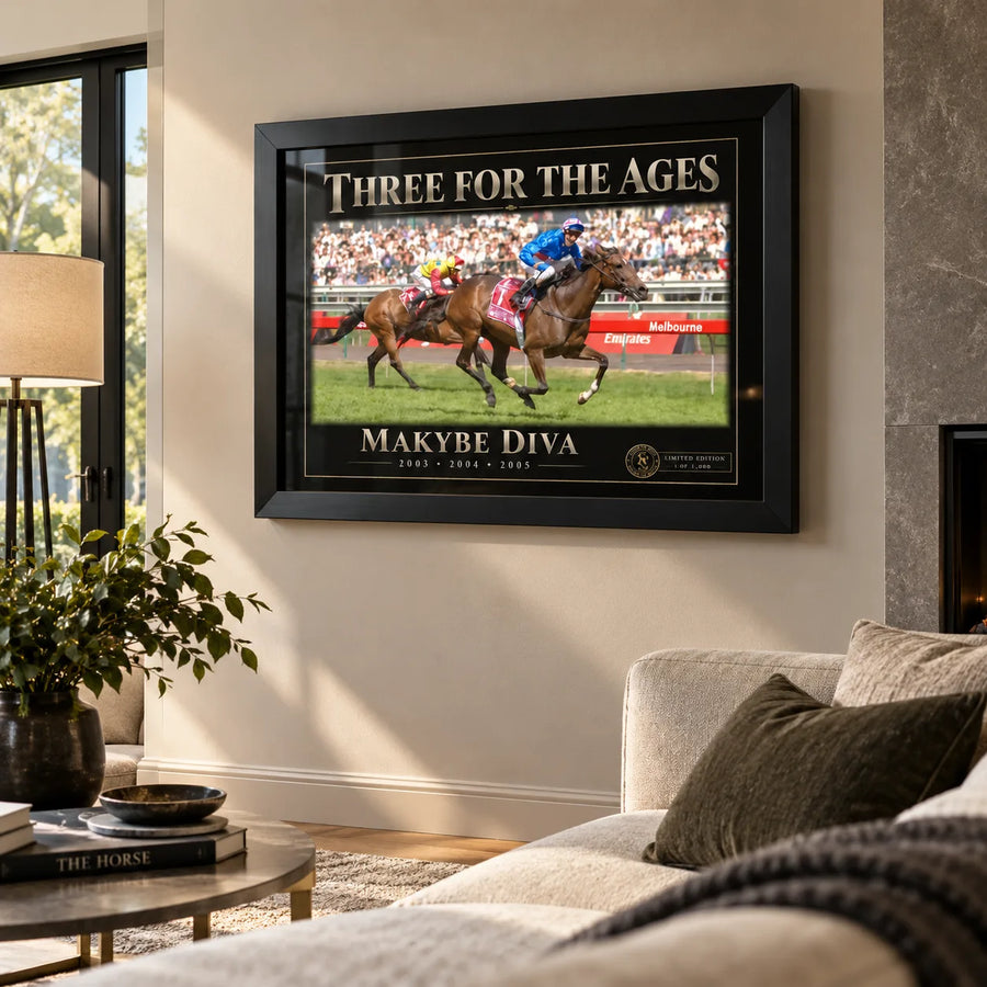 Makybe Diva horse racing wall art in a bright living room, shown in a black frame above a neutral sofa.