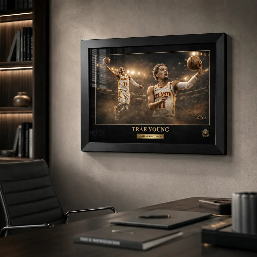 Trae Young framed NBA wall art displayed in a premium office with desk, chair, shelving and controlled lighting.