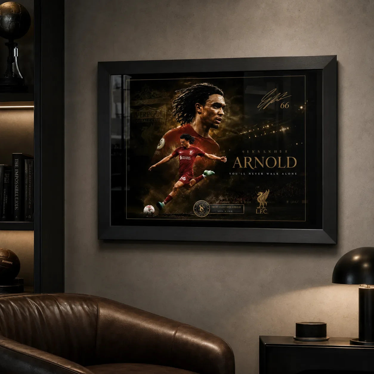 Trent Alexander-Arnold soccer wall art in a black frame mounted in a dark sports room.