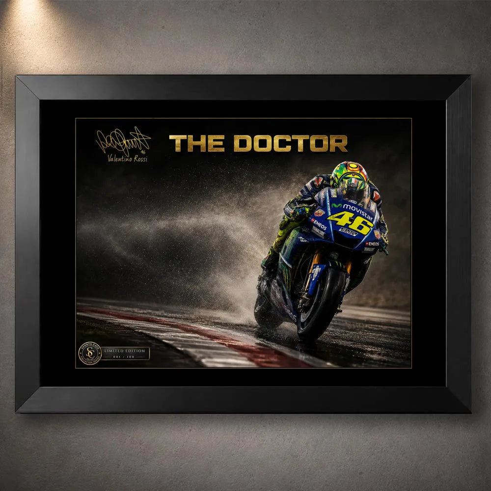 Black framed Valentino Rossi The Doctor motorsport wall art featuring the #46 bike racing through rain.