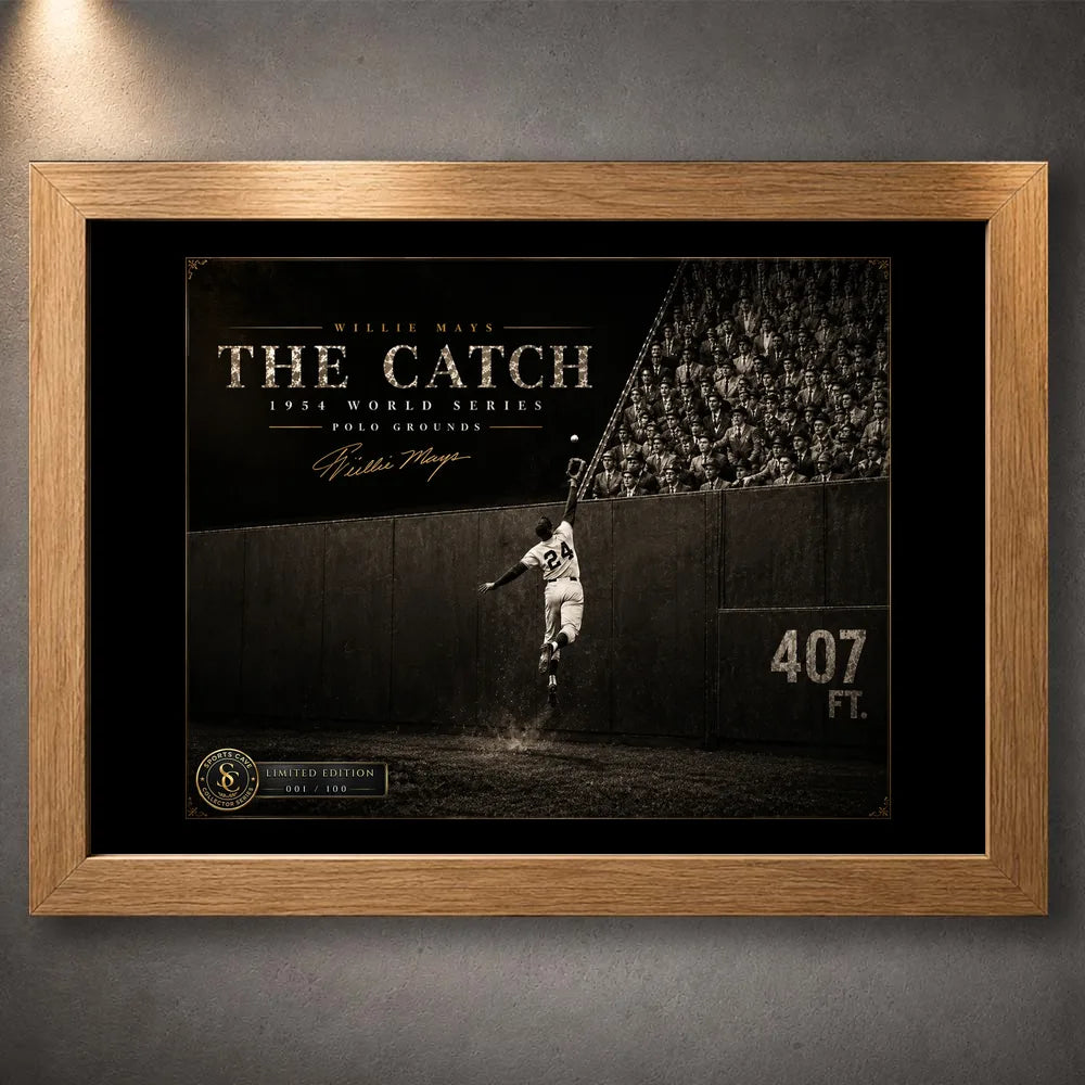 Willie Mays The Catch baseball wall art presented in a natural oak frame against a textured gallery wall.