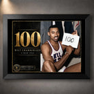 Black framed Wilt Chamberlain basketball wall art featuring the 100 tribute design for a collector wall or sports room.