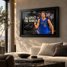 Dirk Nowitzki wall art displayed in a bright living room setting with a black frame above the sofa.