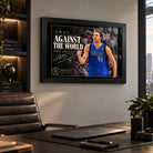 Dirk Nowitzki basketball wall art in a modern office setting, presented in a black frame above the desk.