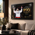 Alex Ovechkin 895 hockey wall art displayed in a contemporary living room with black framing and warm neutral styling.