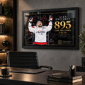 Alex Ovechkin 895 hockey wall art displayed in a modern office with a black frame and dark collector-style interior.