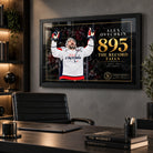 Alex Ovechkin 895 hockey wall art displayed in a modern office with a black frame and dark collector-style interior.