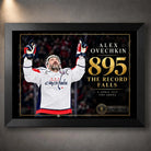 Black framed Alex Ovechkin 895 hockey wall art with gold record tribute design for collectors and serious hockey fans.
