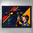 Framed Daniel Ricciardo F1 wall art with Red Bull Racing car and shoey victory celebration in bold graphic design.