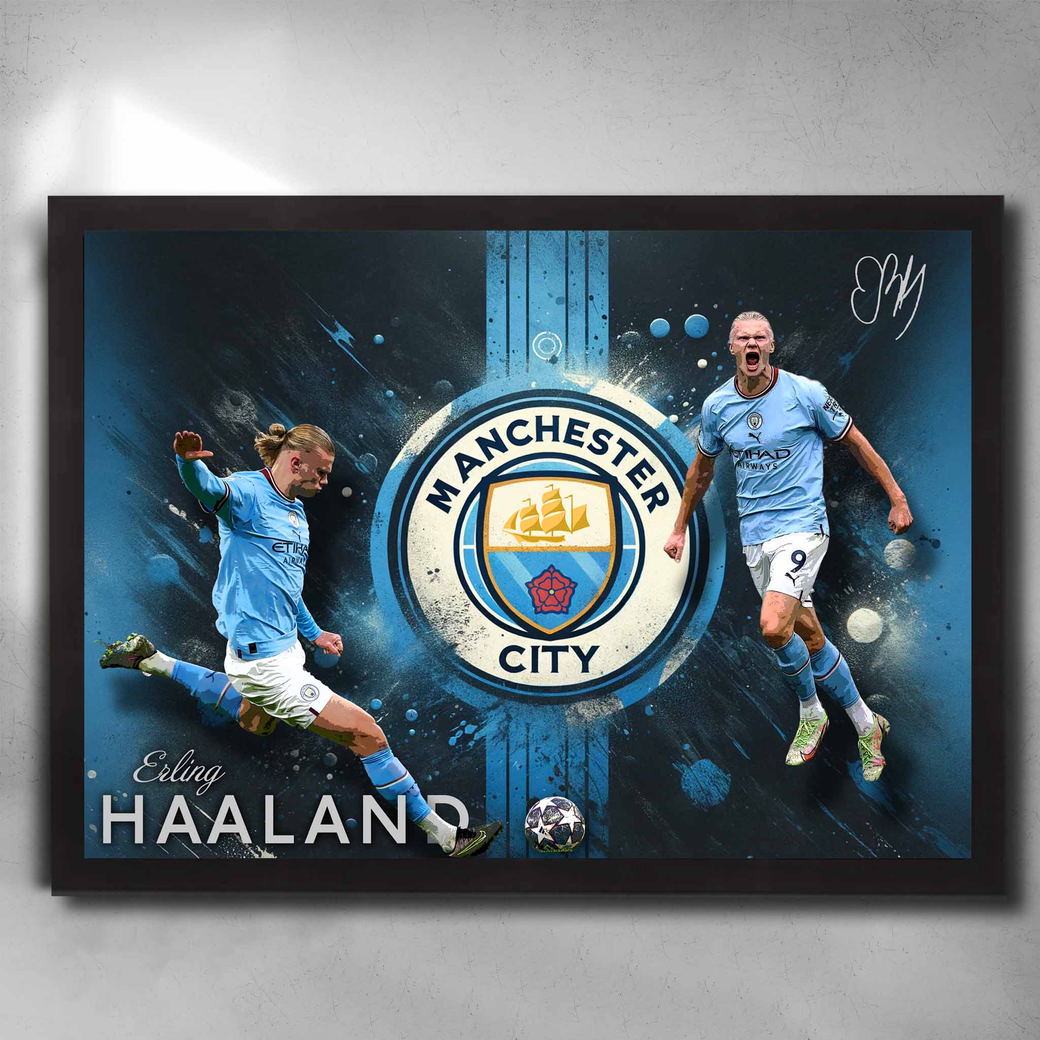 Framed Erling Haaland Manchester City wall art featuring dynamic poses, club crest, and bold blue graphic background.