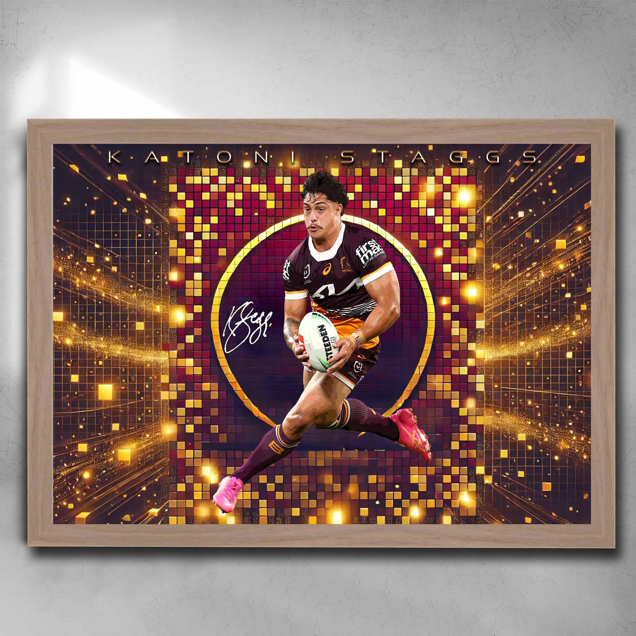 Katoni Staggs Brisbane Broncos wall art in oak frame, showcasing an action shot of Staggs in maroon and gold colors, perfect for NRL fans. Premium fade-resistant framed poster.