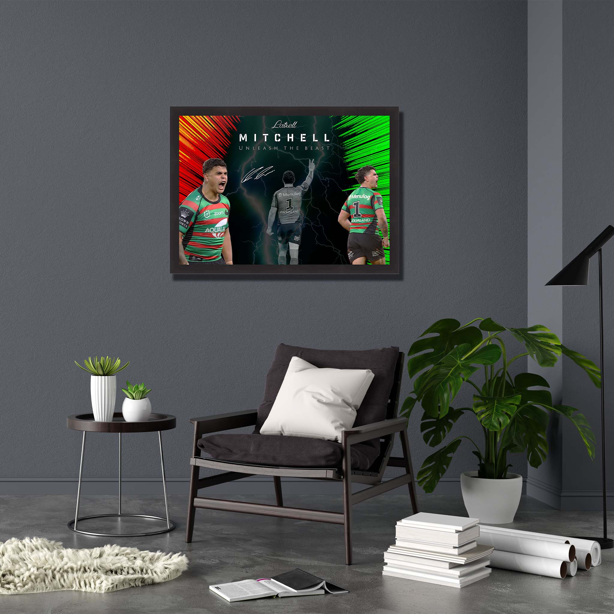 Framed print of Latrell Mitchell hanging on a wall on display.