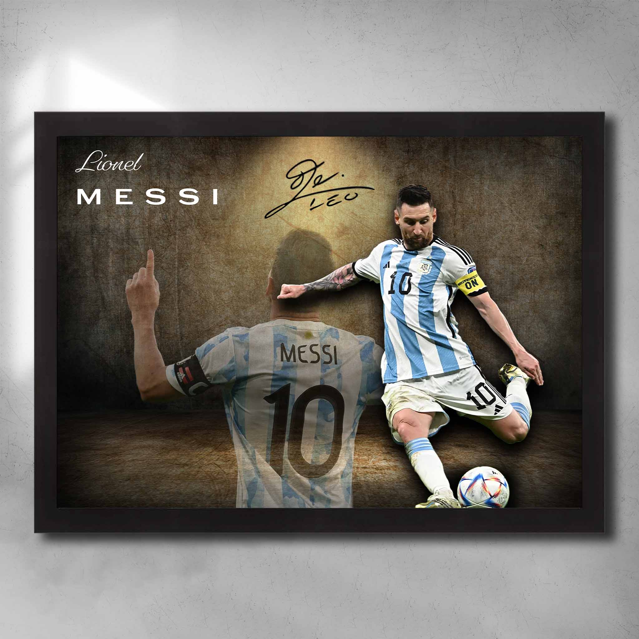 Lionel Messi framed sports art print in Argentina kit, kicking the ball with iconic celebration pose, limited edition collectible.