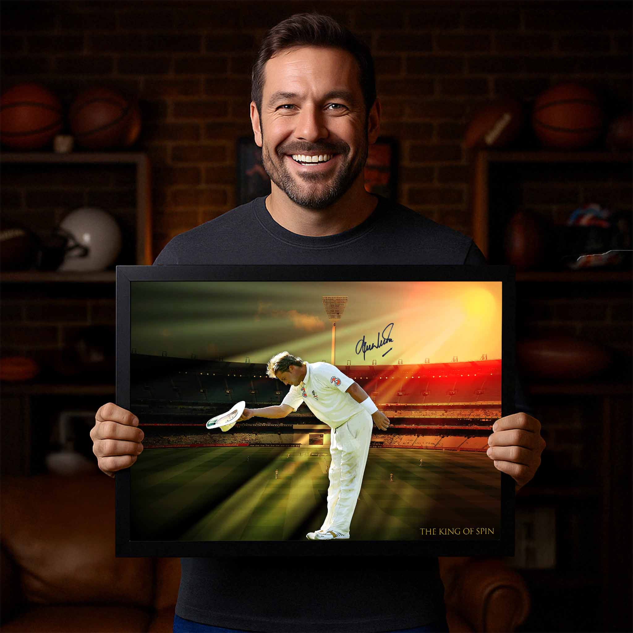 Smiling fan holding framed Shane Warne wall art – premium cricket memorabilia celebrating the spin king's legacy in style.