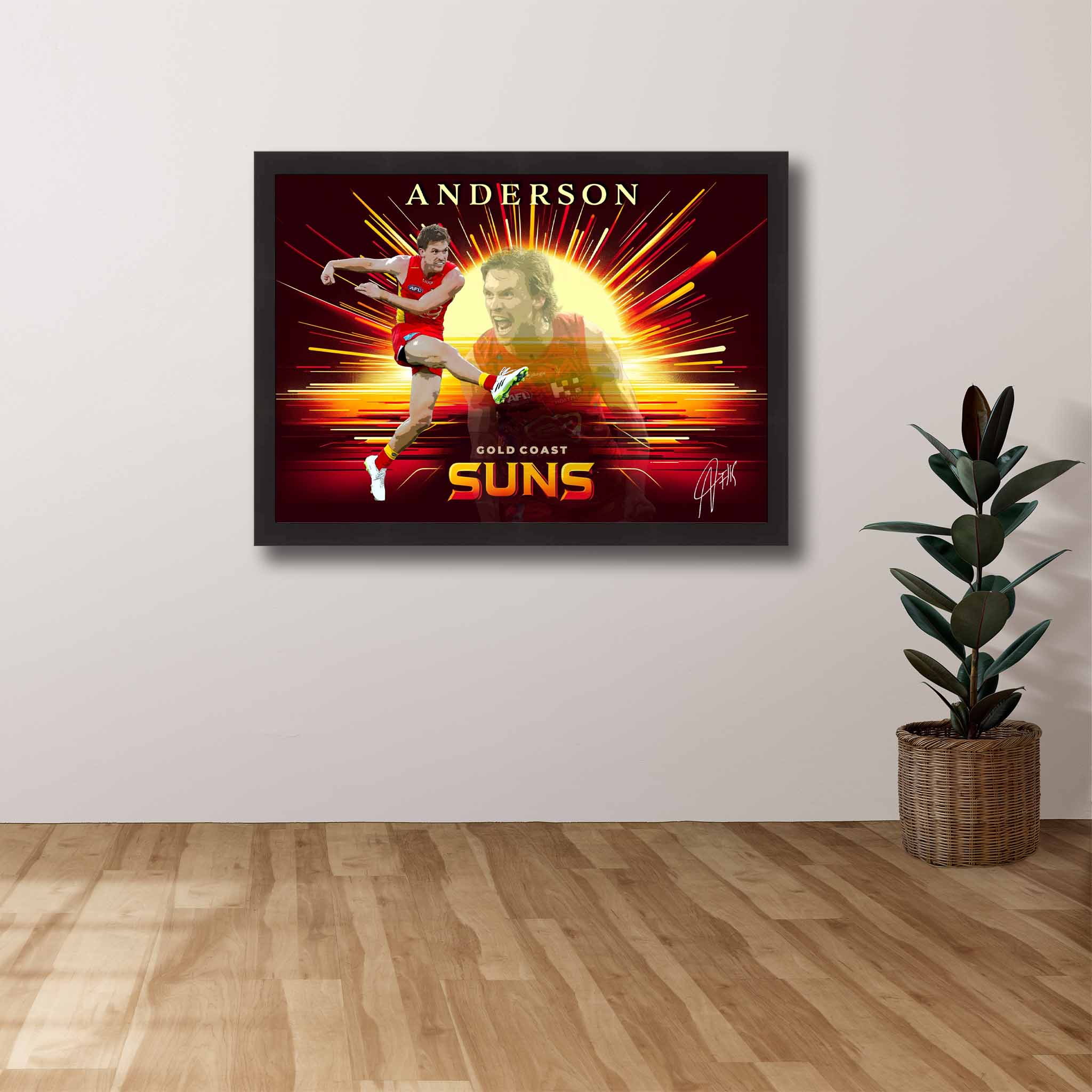 AFL Die-hard Supporters House, featuring a framed print of Noah Anderson showcased on the wall.