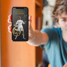 Fan holding smartphone displaying Cristiano Ronaldo digital sports art — a high-resolution mobile-ready printable wall art download.

