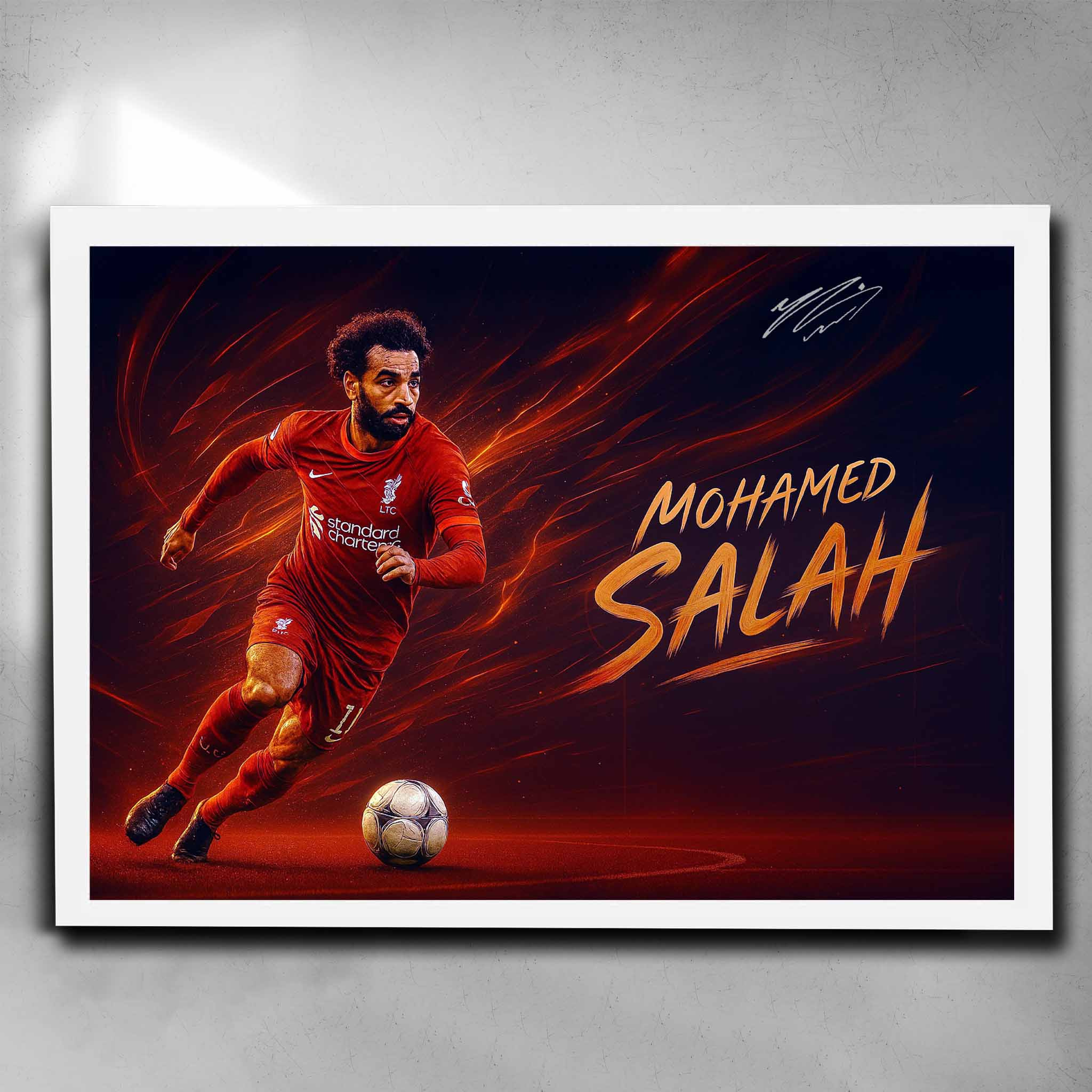 White framed soccer art featuring a signed print of Mohamed Salah from Liverpool FC - Artwork by Sports Cave.