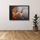 AFL Die-hard Supporters House, featuring a framed print of Tom Green showcased on the wall.