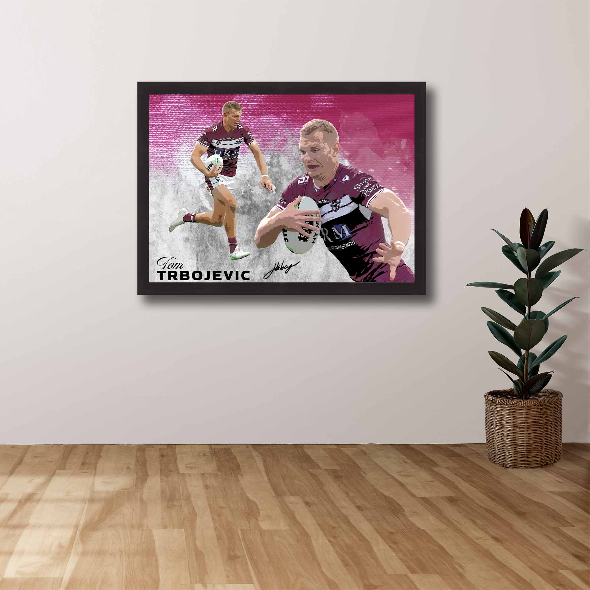 Devoted Manly Sea Eagles fan's tribute: Tom Trbojevic framed art proudly displayed on the wall.