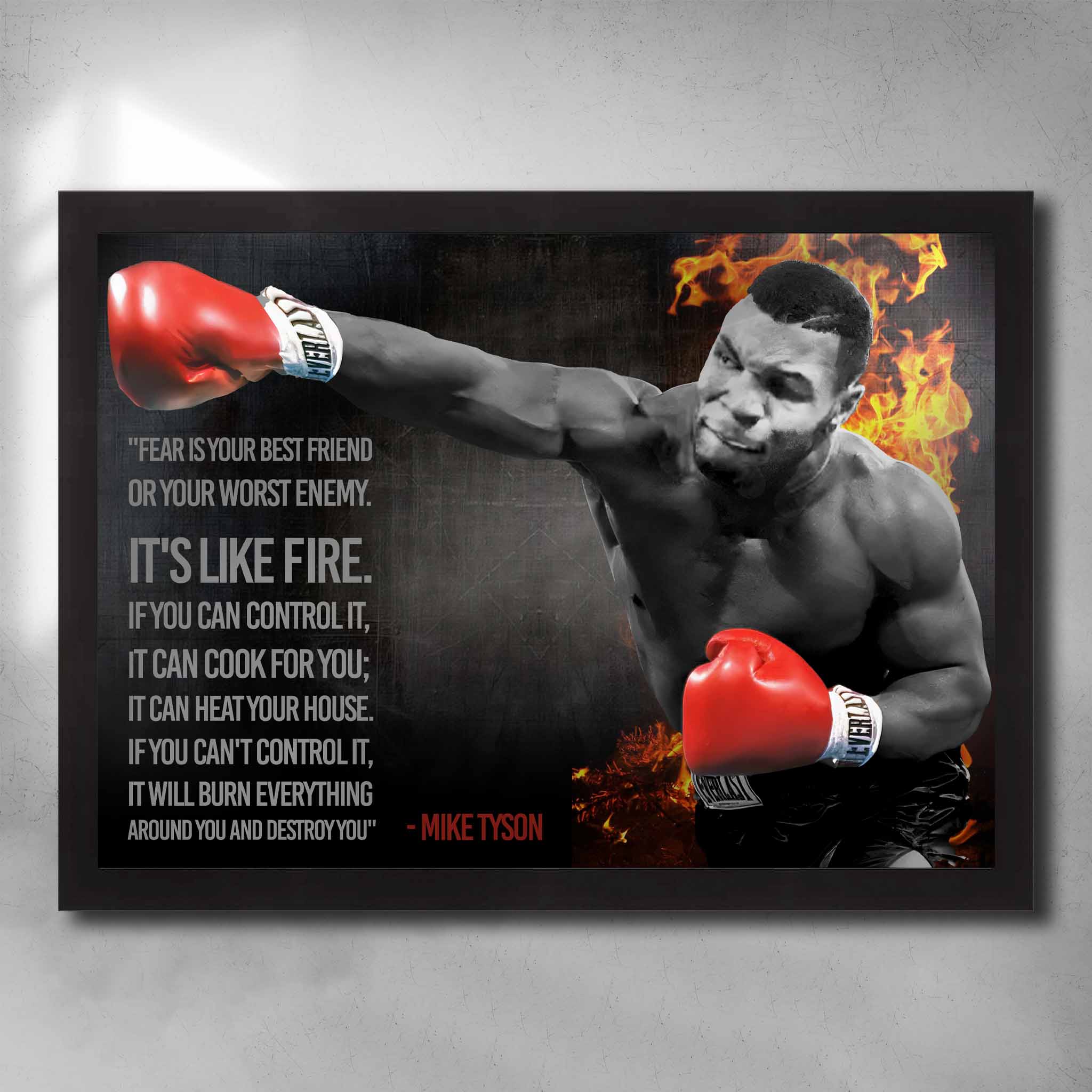 Framed Mike Tyson motivational wall art with boxing pose and quote about fear and fire, red gloves and fiery background.