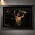 Black framed Alexander Volkanovski wall art featuring the UFC champion with raised fists and title belt.