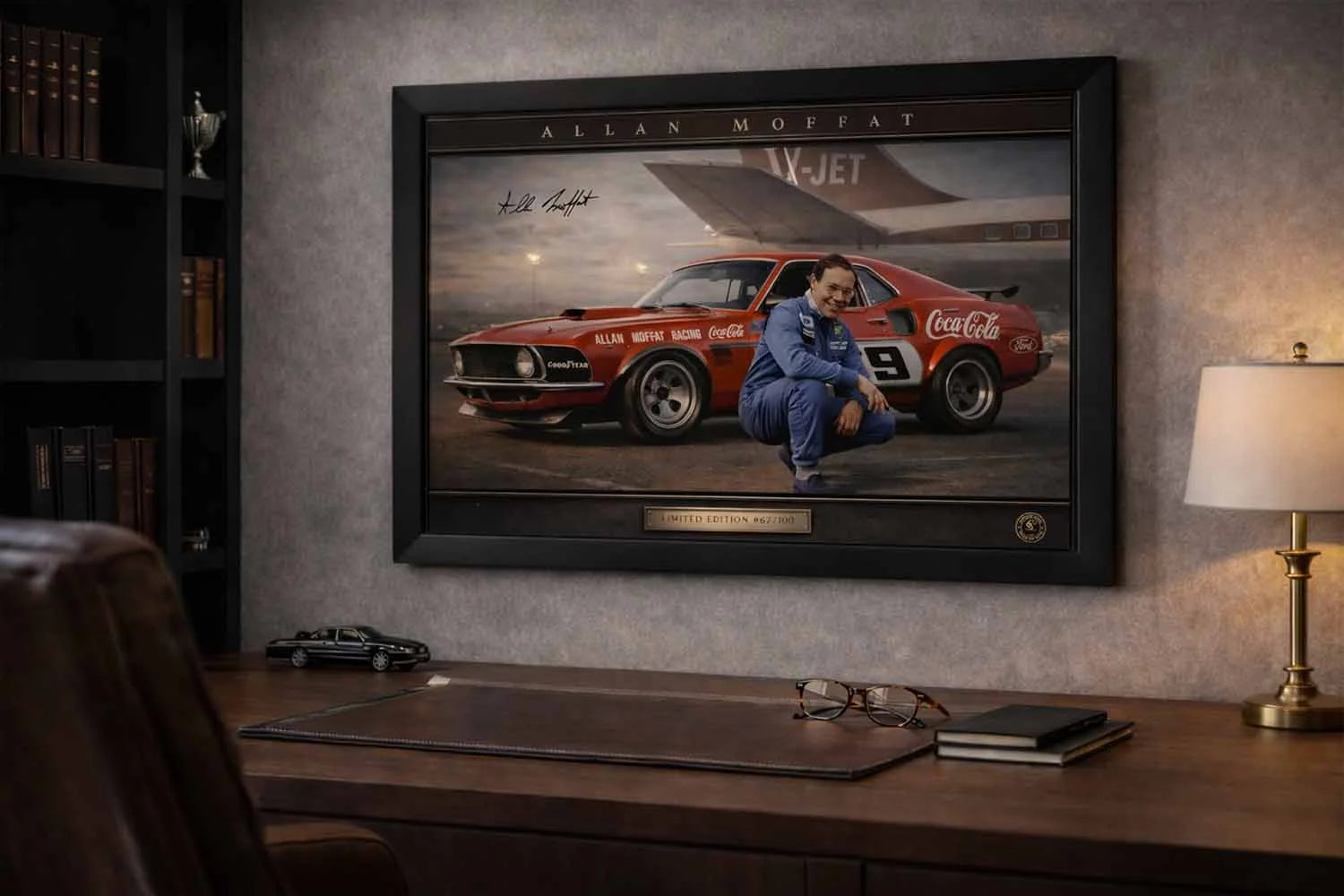 Allan Moffat motorsport artwork showcased in a luxury office interior, styled as framed sports memorabilia.