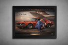 Black framed Allan Moffat racing artwork featuring his iconic red car, designed as premium framed sports art for collectors.