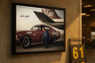 Allan Moffat Coca Cola Ford Falcon racing photograph framed on garage workshop wall