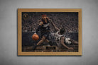 Allen Iverson’s iconic crossover versus Reed presented in a warm oak frame as limited edition sports prints.