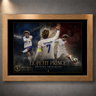 Antoine Griezmann soccer wall art in an oak frame, featuring France-inspired artwork on a dark wall.