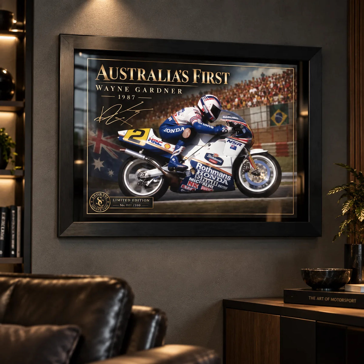 Wayne Gardner wall art displayed in a dark man cave setting with a black frame and premium motorsport collector styling.