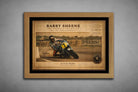 Barry Sheene motorsport print in natural oak frame, warm vintage tones highlighting racing legacy framed sports art