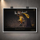 Unframed basketball print hanging with clips against a textured grey wall