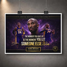 Unframed Kobe Bryant basketball art print hanging with clips, shown on a textured concrete wall.