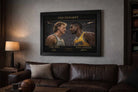 Luxury man cave setup with Larry Bird and Magic Johnson framed poster above leather sofa, stylish man cave wall décor